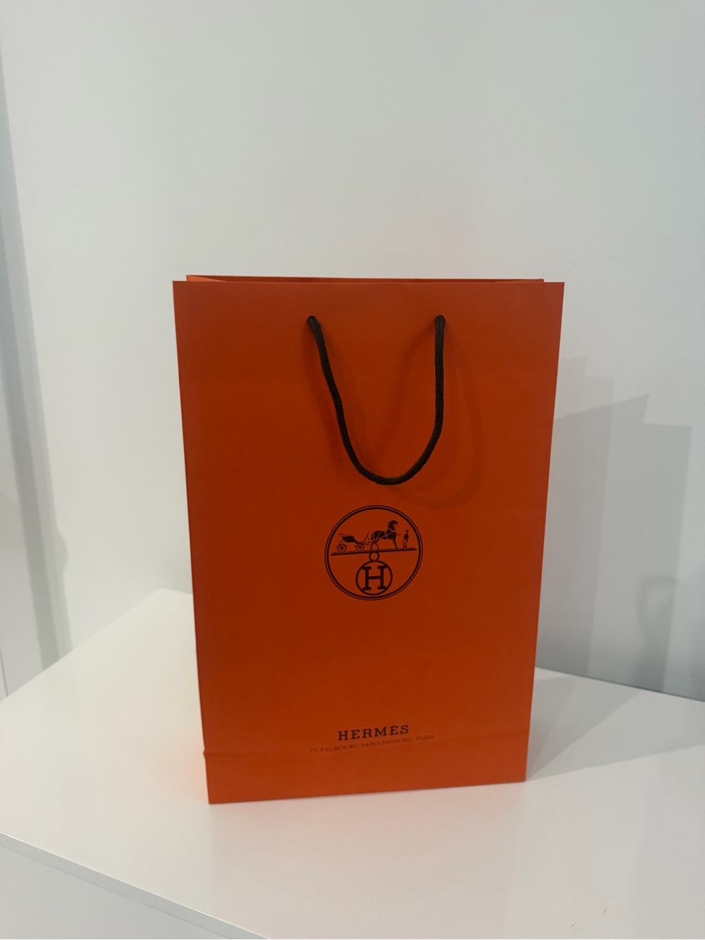 Hermes Orange Shopping Bag with Black Rope Handles